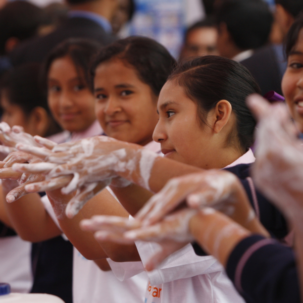 Students handwashing with soap