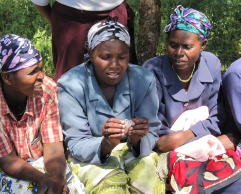 Women in Meru, Kenya, examining Menstrual Cups